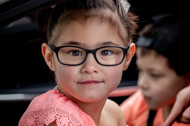A child wearing glasses